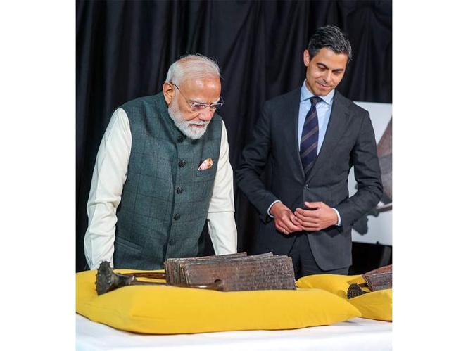 Image from: “Receiving messages of joy, pride”: PM Modi shares significance of Chola copper plates brought back to India