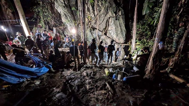 Rescuers find new access route in search for two missing Laos miners ...