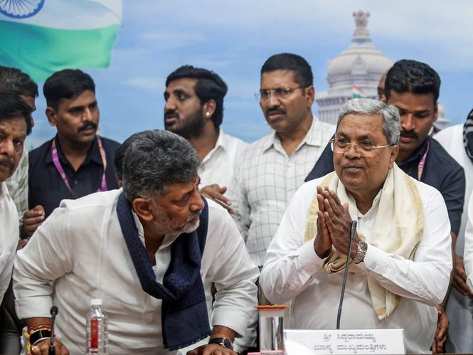 Image from: Cabin seat scramble: Congress leaders flock to Delhi ahead of June 3 Karnataka cabinet swearing-in; BJP mocks 'change of driver'