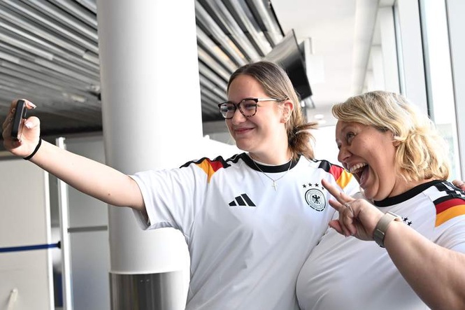 Image from: National team shirts for passengers on Germany flight to World Cup