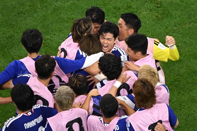 Daichi Kamada's late header gives Japan a 2-2 draw with the Netherlands in World Cup opener for both