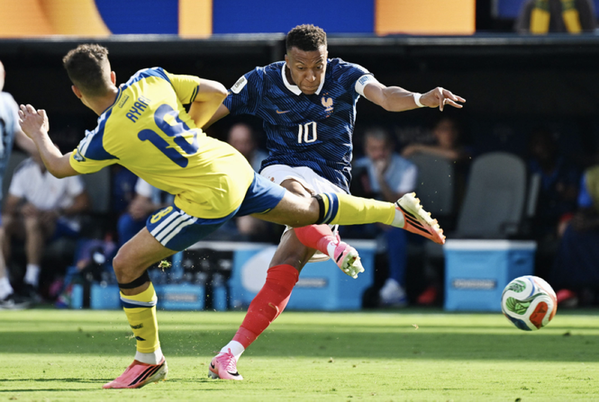 Mbappe fires France into World Cup last 16