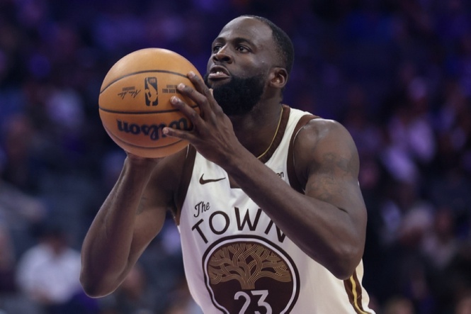 Draymond agrees to stay with Warriors