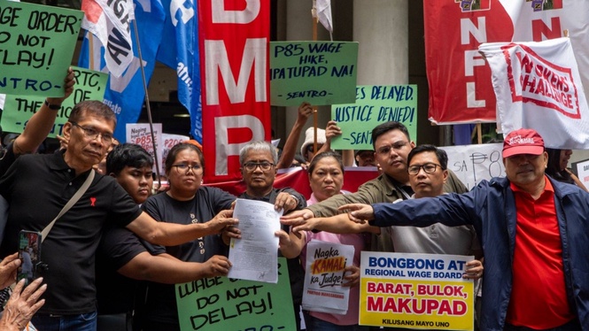 San Fernando, 200 workers storm Pasig RTC over NCR wage hike TRO