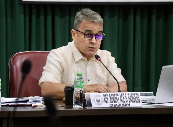 Barbers urges officials favoring China interests to resign