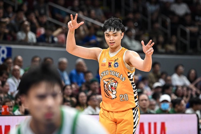 UST bounces back, holds off La Salle