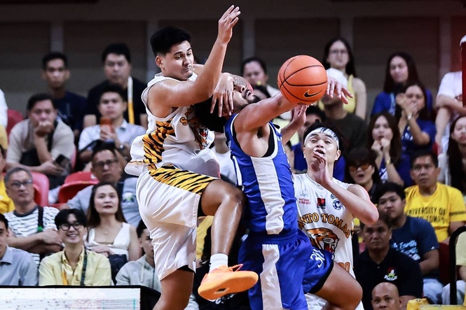 UAAP: Tigers claw Blue Eagles to cap first round on high note