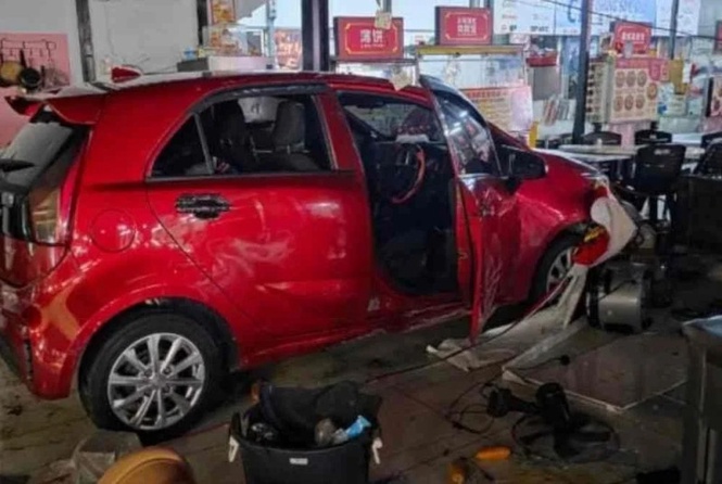 Woman killed by collapsing iron pole after car crashes into Kajang food court