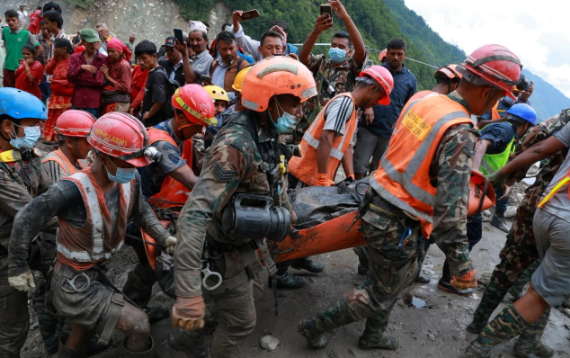 Rescue efforts intensify after two workers found alive in Nepal flood disaster