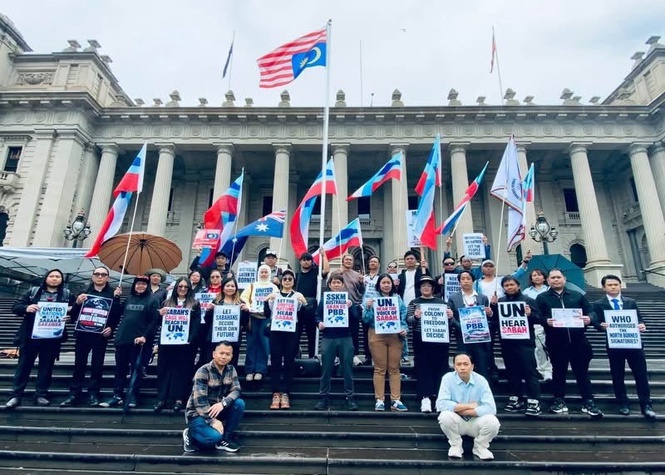 Minister urges police reports over upside-down Jalur Gemilang protest in Australia