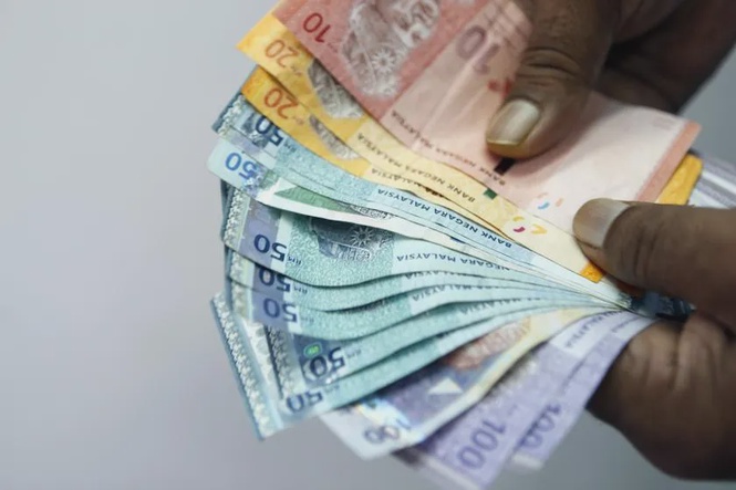Ringgit ends higher against US dollar on renewed risk appetite