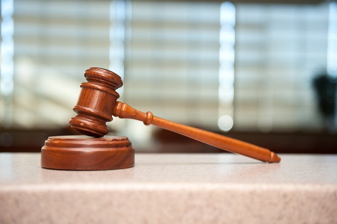 Lab assistant charged with killing motorcyclist now pleads not guilty to drug charge
