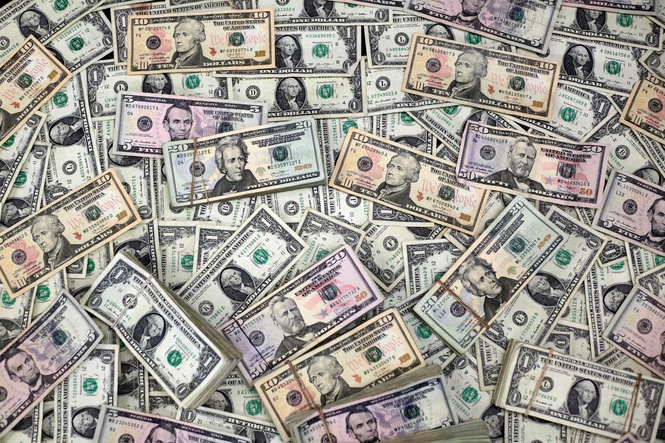 Ringgit opens flat against US dollar, mostly higher versus major currencies
