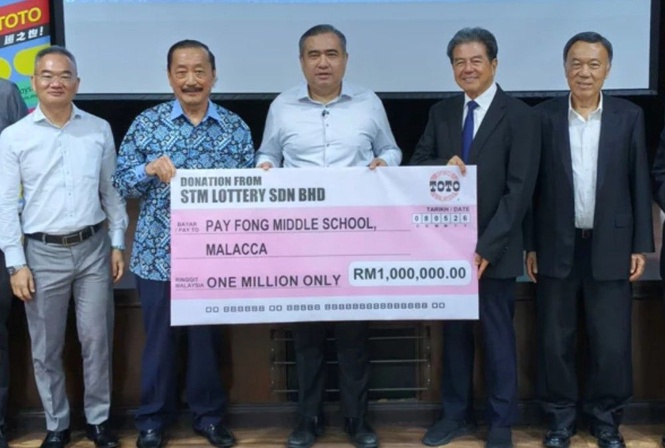 陆兆福牵线促成善举 陈志远捐100万助培风中学宿舍建设