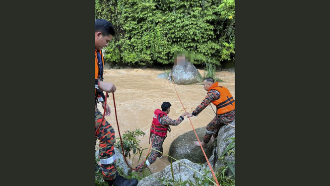 Image from: Eight boys rescued from water surge in Cameron Highlands