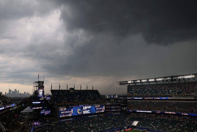 Image from: Lightning, downpour, a two-hour delay: Bad weather hits the World Cup
