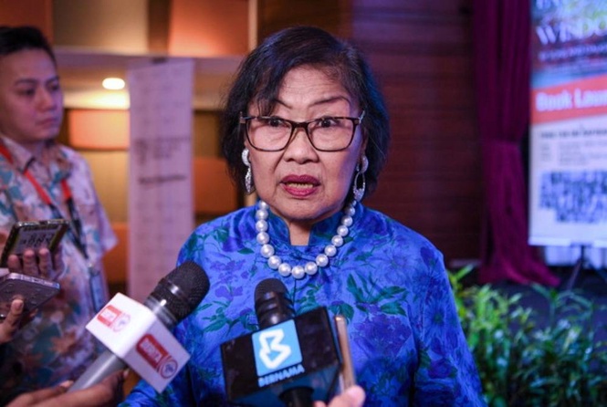 Image from: Former minister Rafidah Aziz warns public of scam video exploiting her image