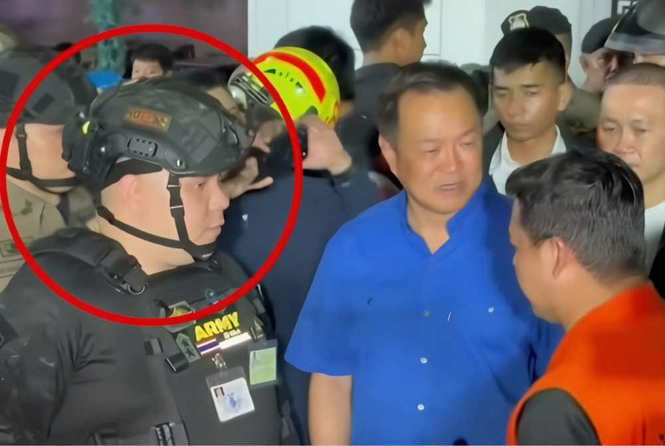 Image from: Man under probe for allegedly impersonating official at Bangkok fire site