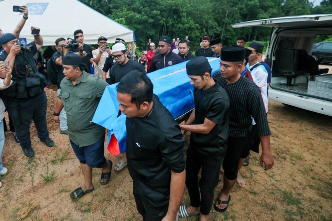 Image from: Electrocuted police officer laid to rest in Kota Bharu