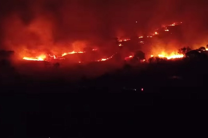 Wildfire warning as UK bakes in third heatwave of the summer