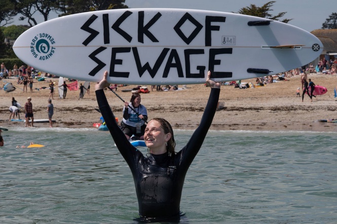 Thousands of surfers to stage ‘paddle out’ protest across UK over ‘broken’ water system