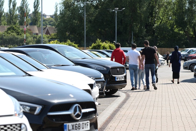 Should you buy a used luxury car or a new car? Here are the pros and cons