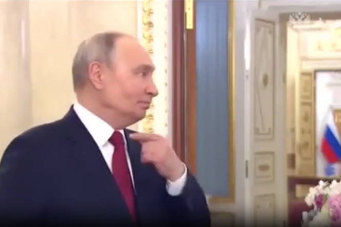 Vladimir Putin suffers coughing fit in video deleted by the Kremlin