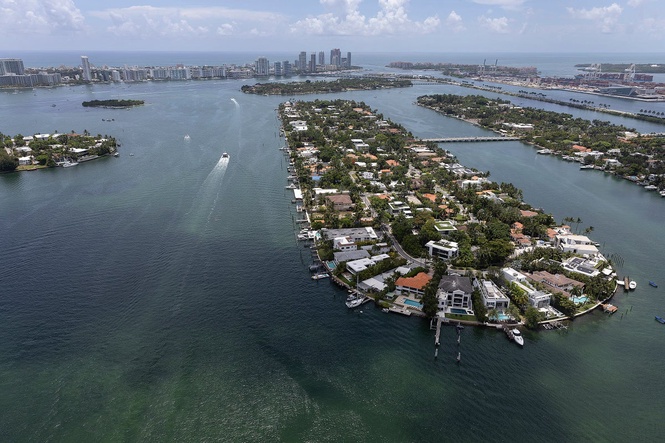 Miami tugboat captain charged over deaths of three girls in sailboat crash was distracted by cellphone, prosecutors say