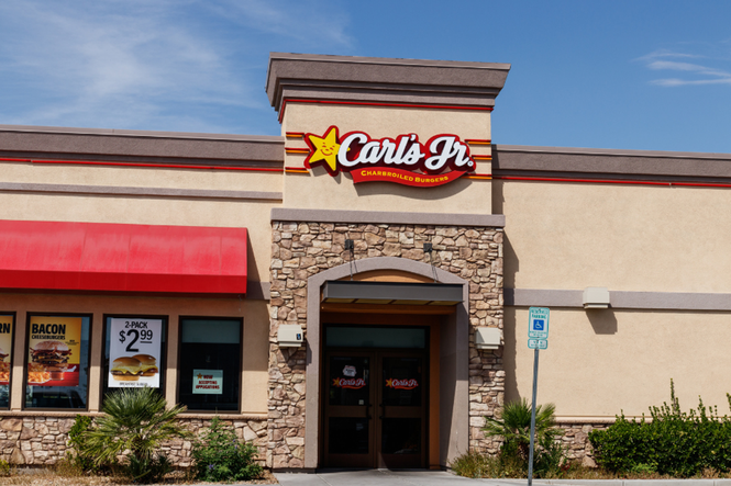 Struggling Carl Jr’s starts up new promotion that rewards customers for driving past its rival