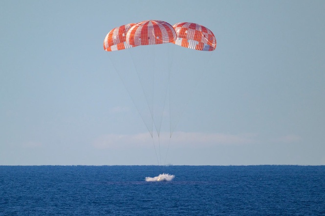 First manned Moon mission in more than 50 years splashes down after epic voyage