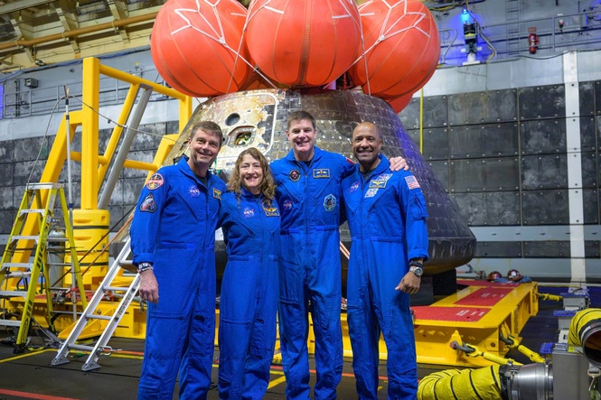 Artemis II's moon-traveling astronauts return home to cheers after a record-breaking trip