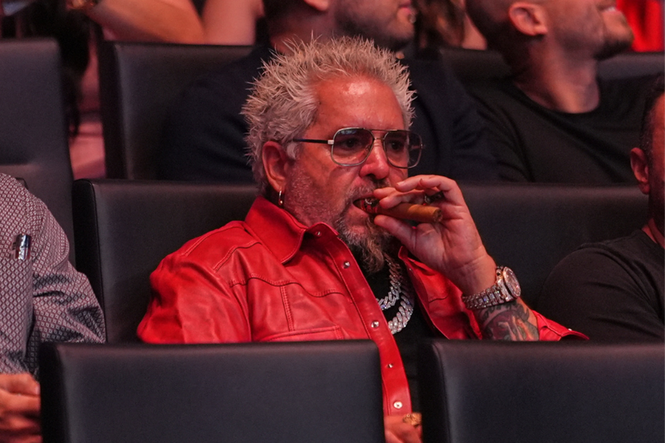 Guy Fieri speaks out about viral video of friendly exchange with Tate brothers - but the internet isn’t buying it