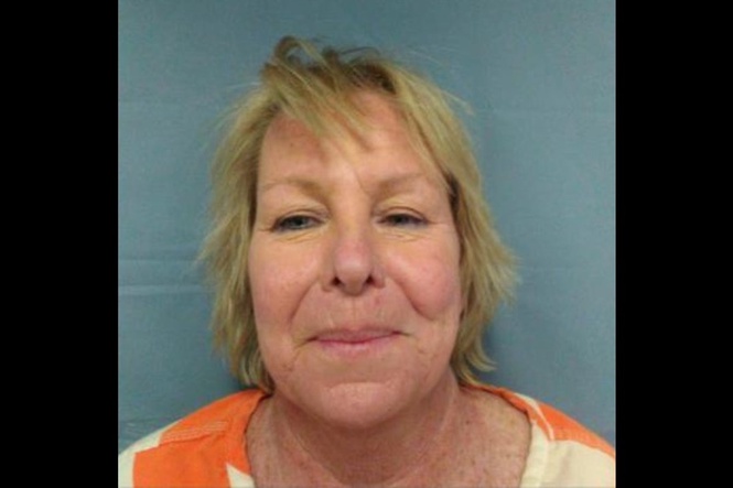 Woman chucked beer bottles at 3-year-old who approached her after she fell off her bike, cops say
