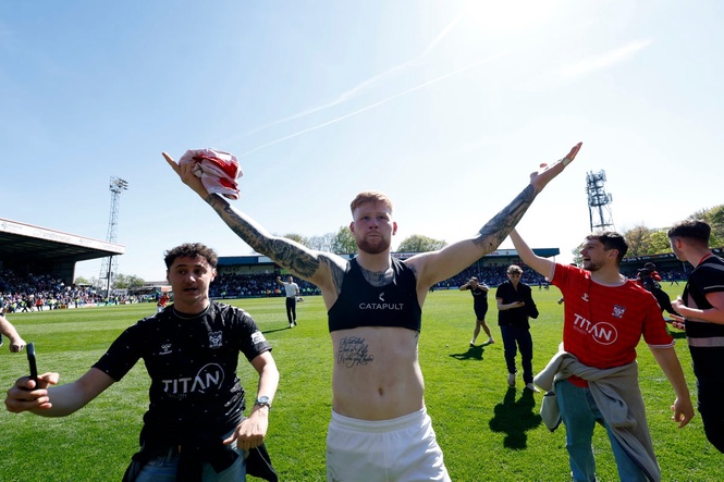 How York broke Rochdale hearts in eight minutes of title-deciding chaos