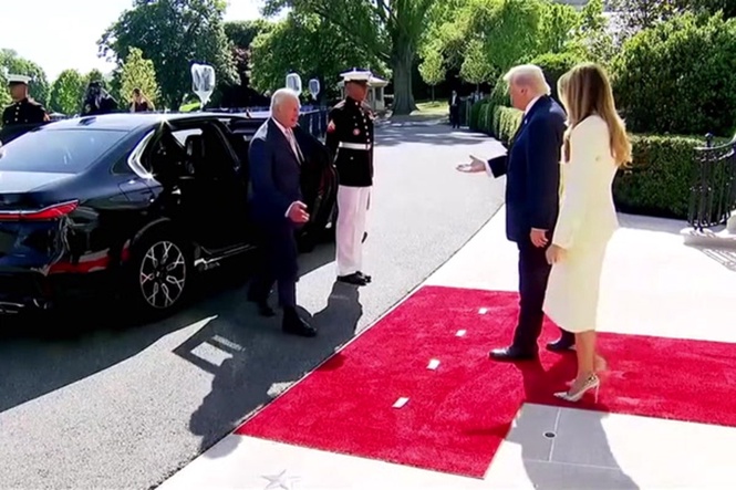 Donald Trump greets King Charles with infamous power handshake