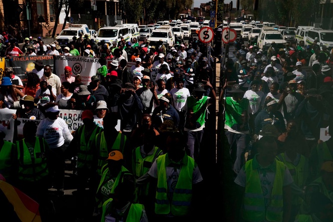 Hundreds march in Johannesburg against illegal migration as shops shut over looting fears