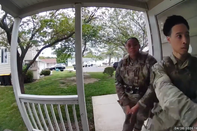 Moment Air Force officers storm ‘wrong house’ and hold child at gunpoint prompting investigation