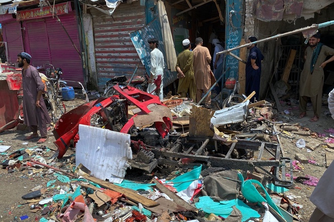 Bomb rigged to rickshaw explodes in Pakistan bazaar, killing 9 and wounding more than 2 dozen others