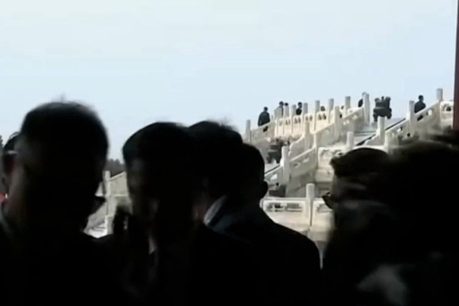 White House staffer ‘bruised and shaken’ after being knocked down and trampled by Chinese reporters, report says