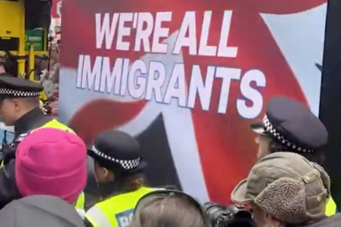 Giant pro-immigration message interrupts Tommy Robinson’s Unite the Kingdom rally