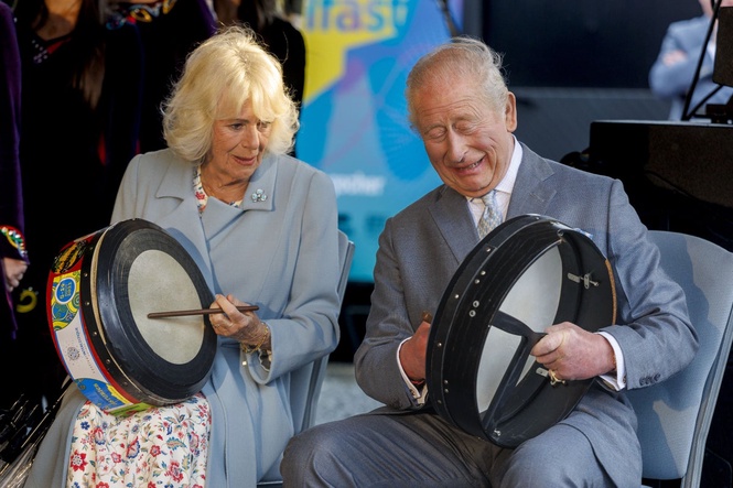 Charles and Camilla keep the beat on bodhran drums before sampling whiskey
