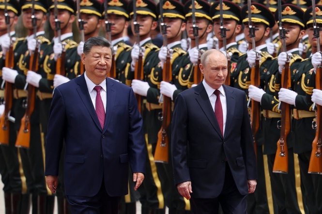 Xi Jinping and Vladimir Putin meet in Beijing to sign 47-page document