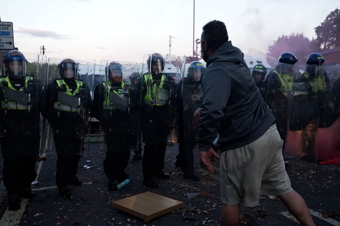 11 police officers hurt after protests over Henry Nowak’s murder turn violent