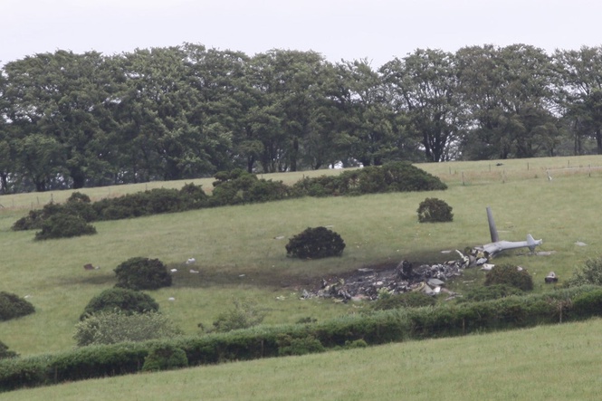 Royal Navy helicopter crashes into Devon field