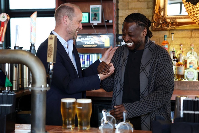 Prince William spotted pulling pints behind the bar at south London pub