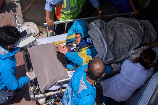 Family questions rescue efforts for Sherpa guide found alive on Everest