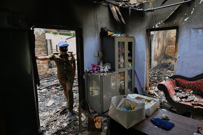 Unregistered Sri Lankan nursing home lies in ruins as toll from deadly fire rises to 13