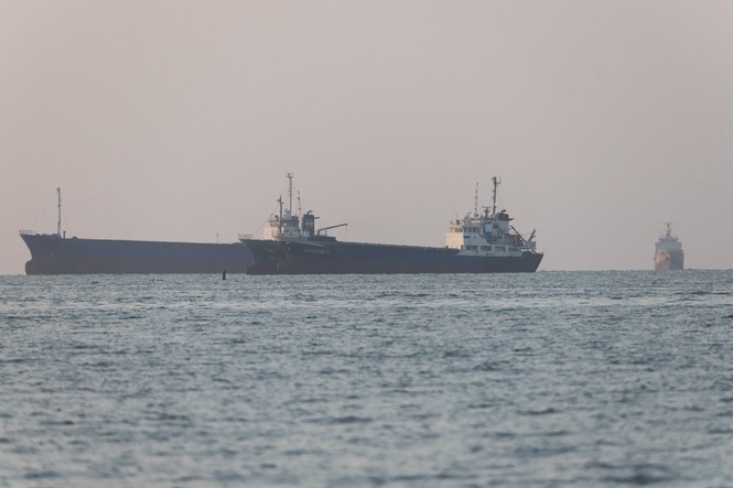 Iran-US war latest: Gunmen fire at cargo ship near key trade route as Tehran threatens to pull out of peace talks