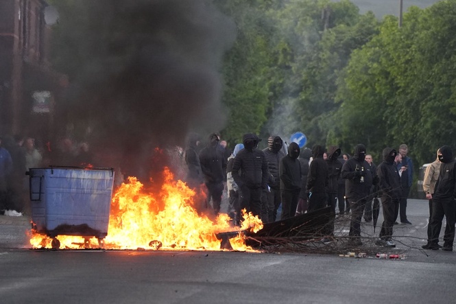 Arrest after two police officers ‘savagely targeted’ with petrol bomb
