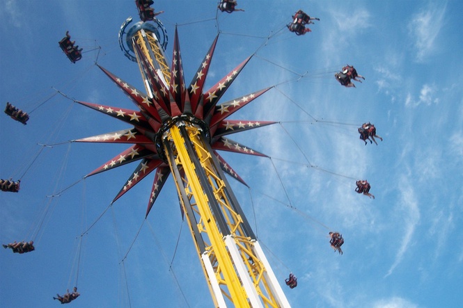Four people, including two teens, rescued after malfunction strands them 120 feet in the air on Six Flags ride